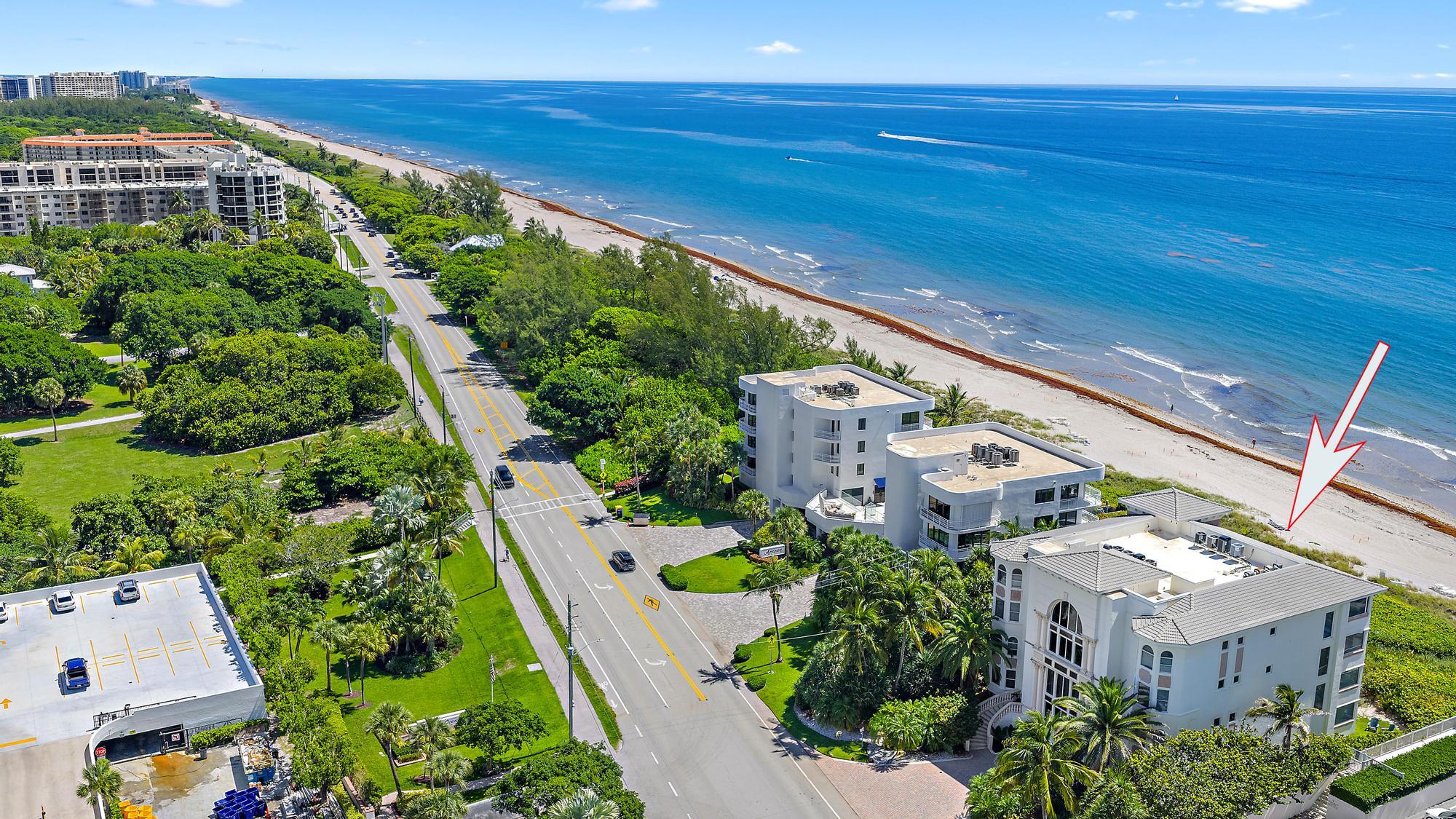 Undisclosed Address Boca Raton, FL 33431 - Photo 44 of 47 an aerial view of multiple houses with yard