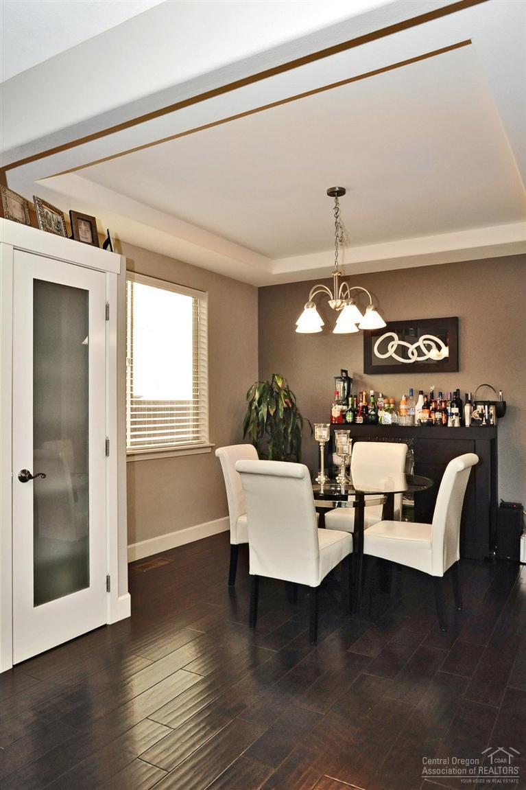 One of two dining areas. Pantry at left