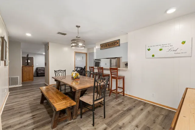 a view of a dining room with furniture