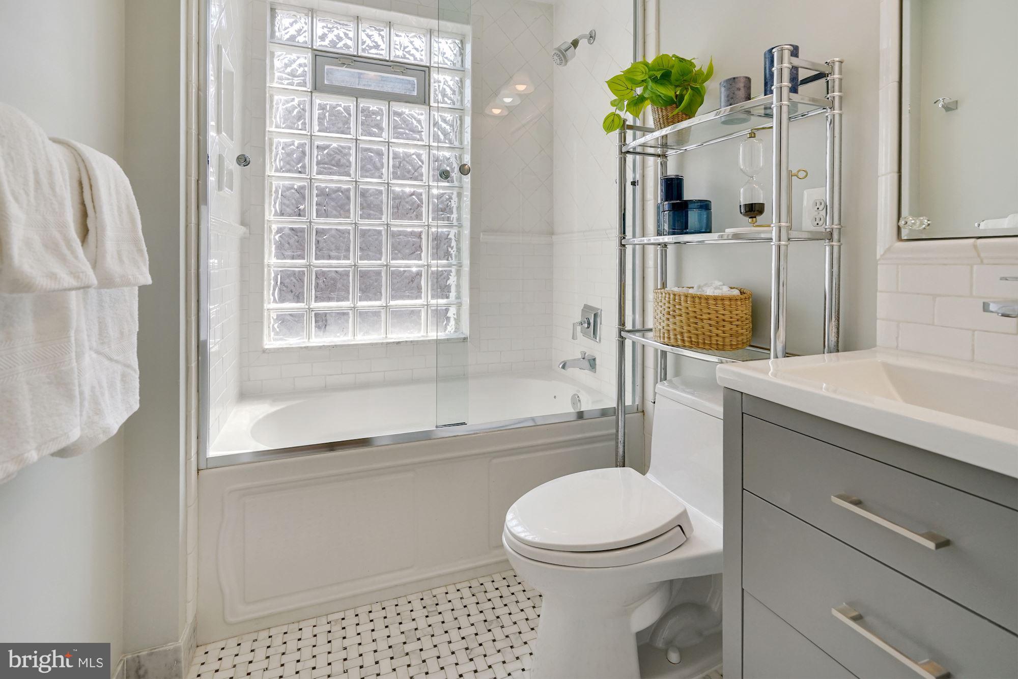 1830 Corcoran Street Northwest Washington, DC 20009 - Photo 14 of 20 Updated full bath off of second bedroom