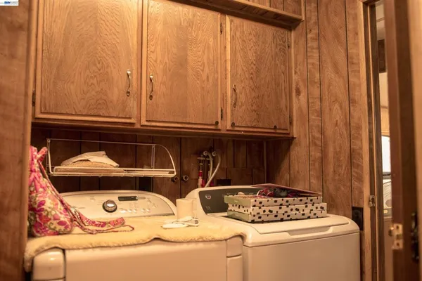 a kitchen with an oven and cabinets