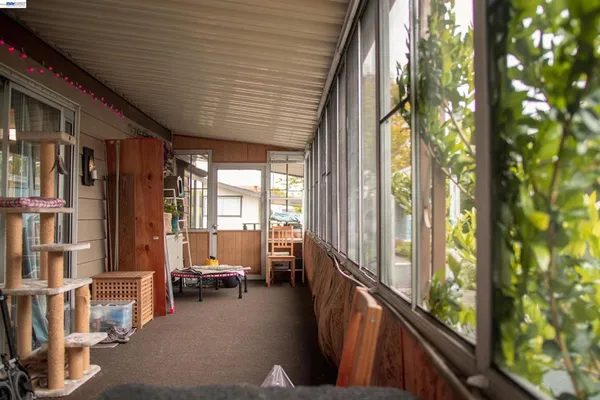 a view of a porch and furniture