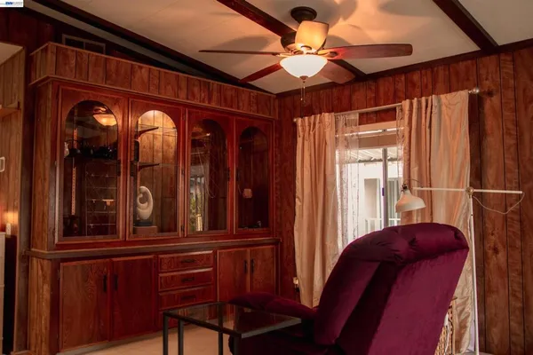 a view of a windows and a ceiling fan