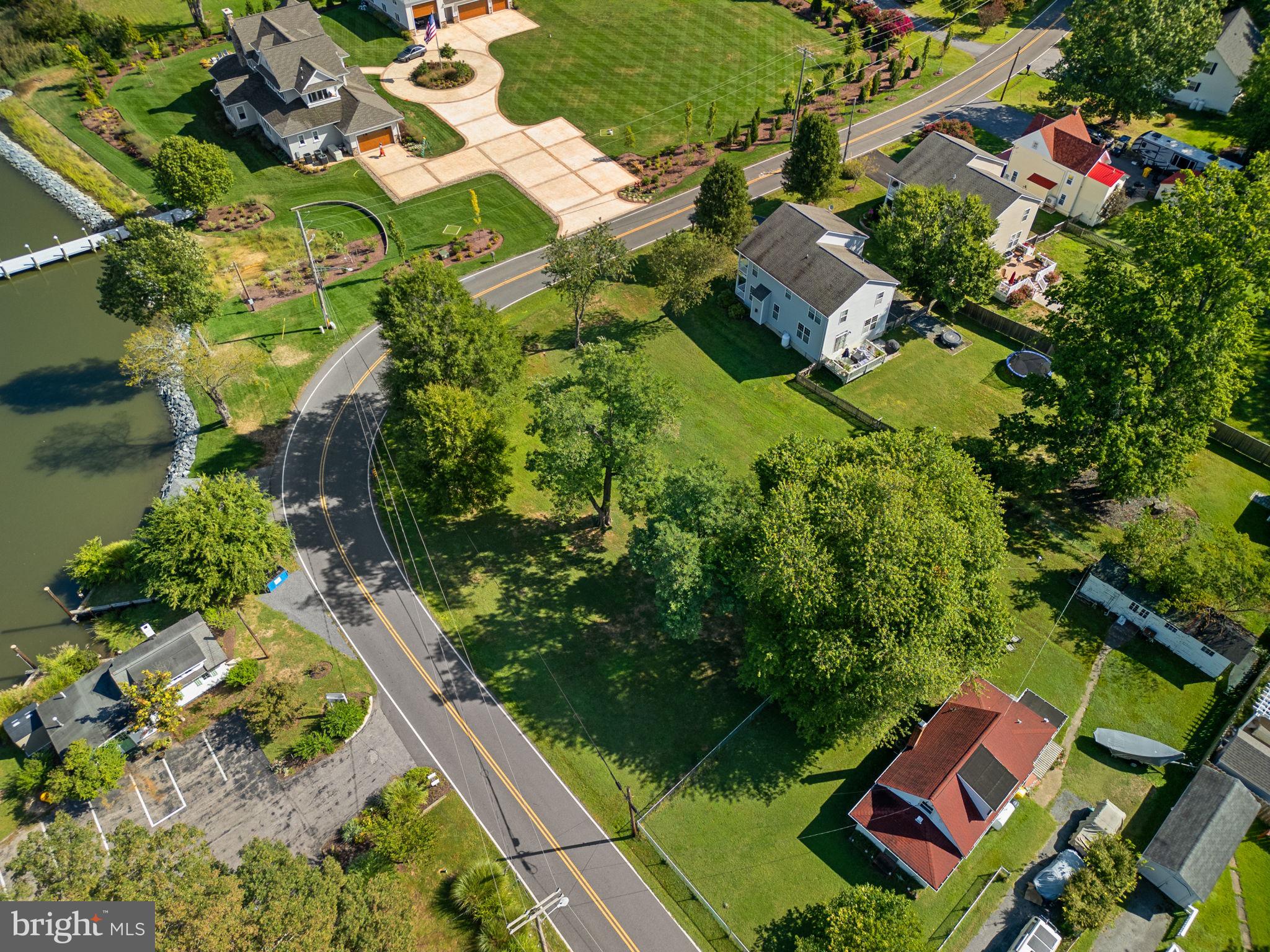 6061 Drum Point Road Deale, MD 20751 - Photo 2 of 10 an aerial view of a house with a yard