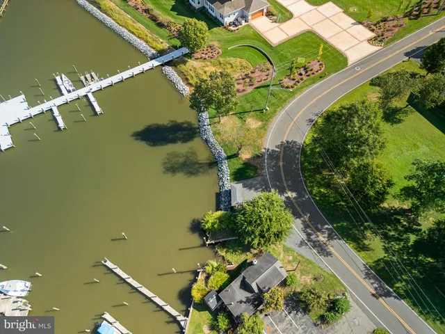 a bird view of a house with a yard