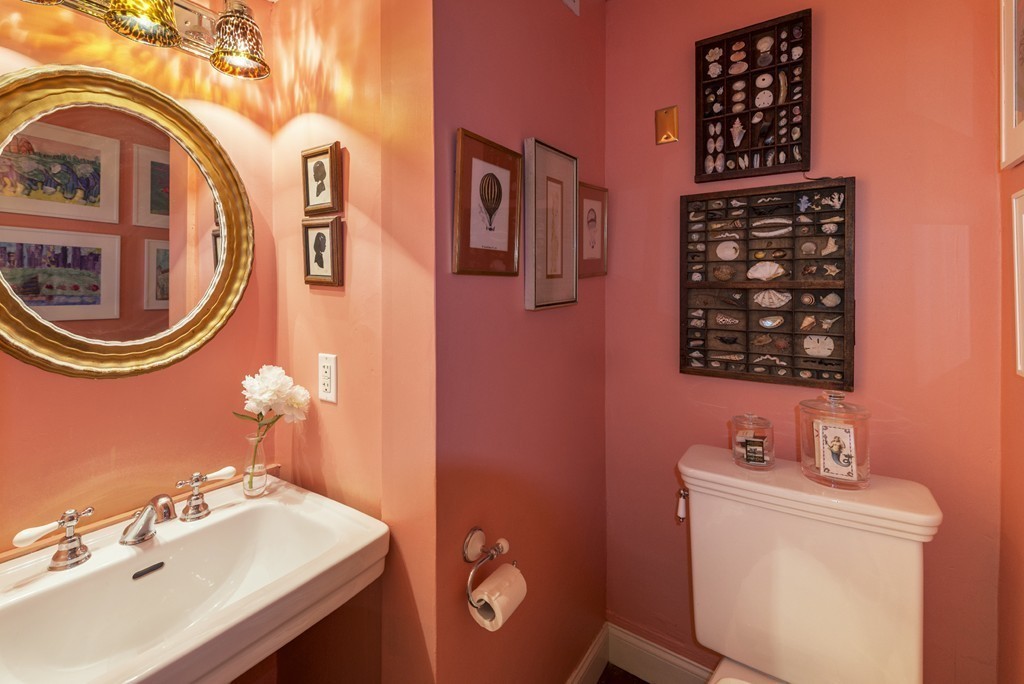 86 County Road Ipswich, MA 01938 - Photo 8 of 30 a bathroom with a sink a mirror and a toilet