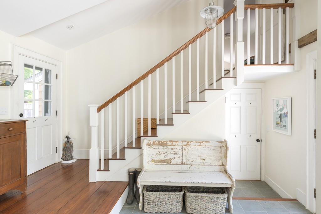 86 County Road Ipswich, MA 01938 - Photo 10 of 30 a view of entryway and hall with wooden floor