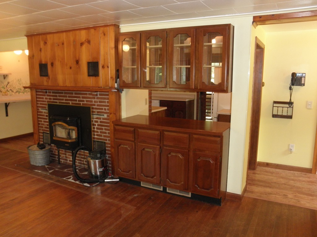 139 Southampton Road Westhampton, MA 01027 - Photo 15 of 27 a living room with furniture a fireplace and wooden floor