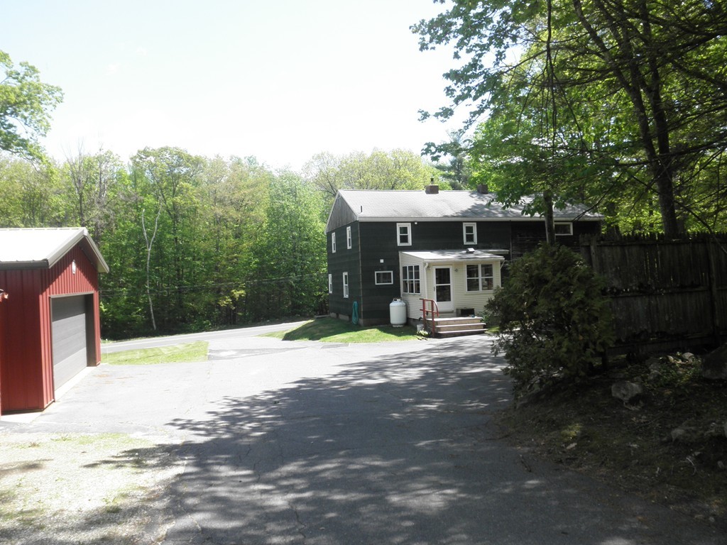 139 Southampton Road Westhampton, MA 01027 - Photo 5 of 27 a front view of a house with a yard and trees