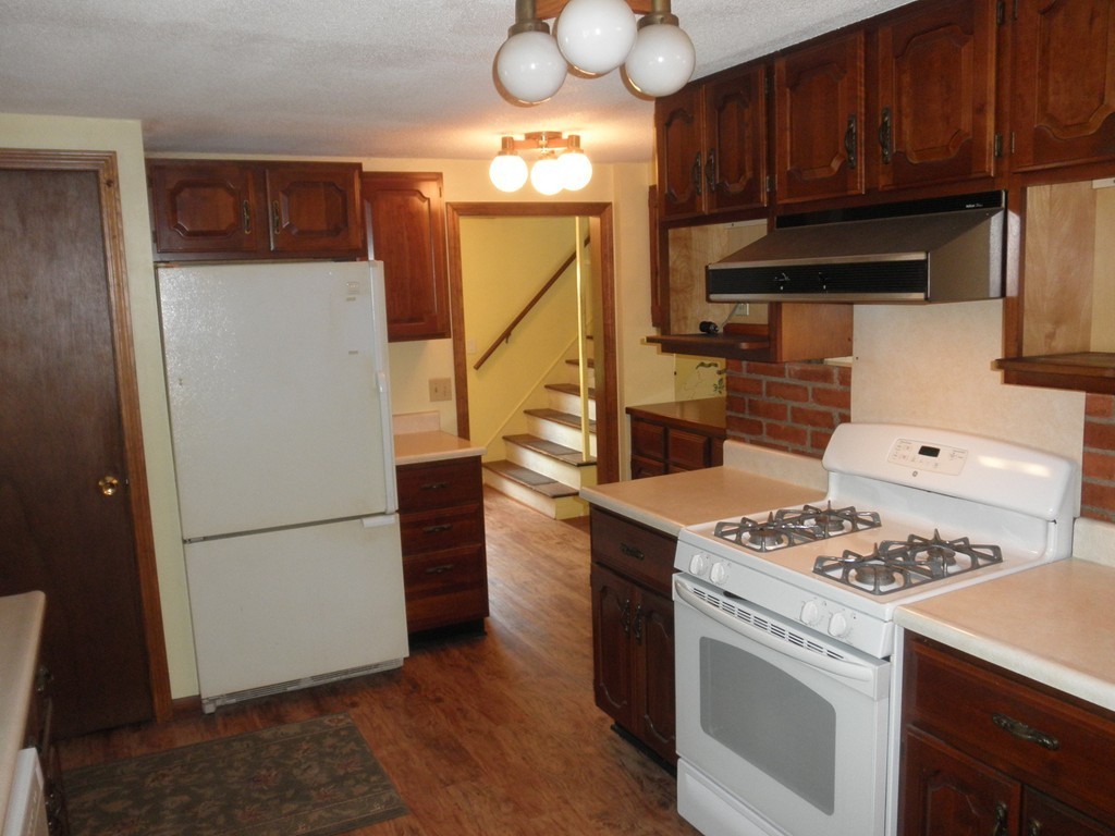 139 Southampton Road Westhampton, MA 01027 - Photo 8 of 27 a kitchen with a appliances and a cabinets