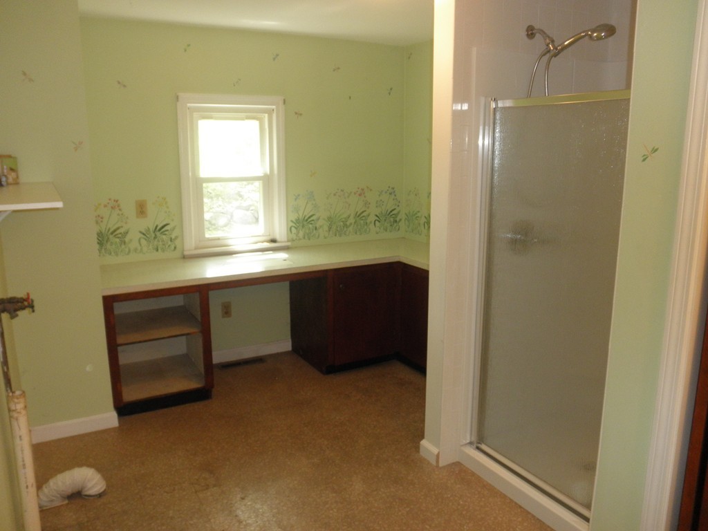 139 Southampton Road Westhampton, MA 01027 - Photo 9 of 27 a room with window and cabinet