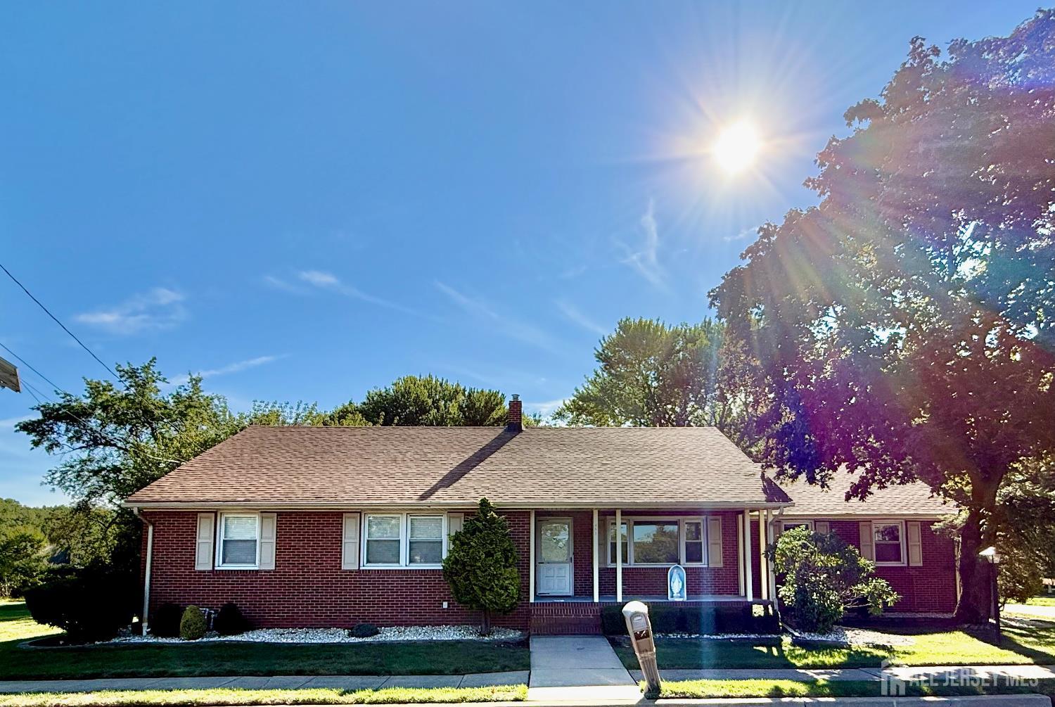 452 Cranbury Road East Brunswick, NJ 08816 - Photo 1 of 16 a front view of a house with garden