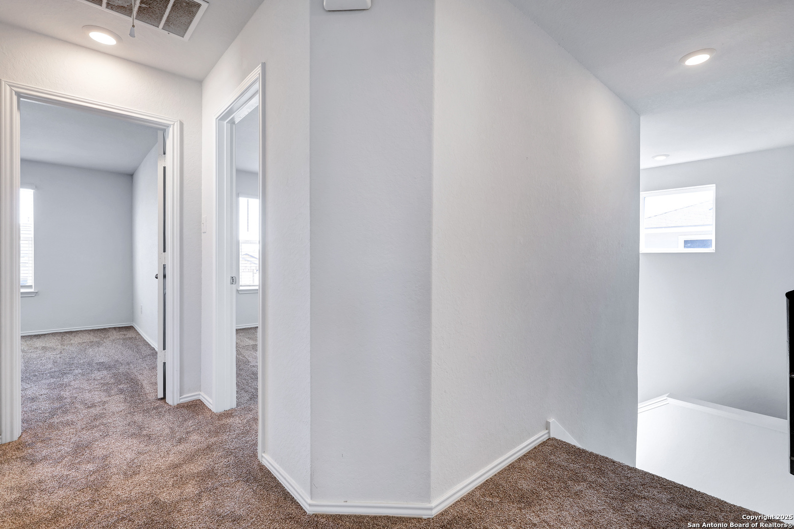 5867 Kendall Prairie San Antonio, TX 78244 - Photo 13 of 25 a view of a room with a hallway