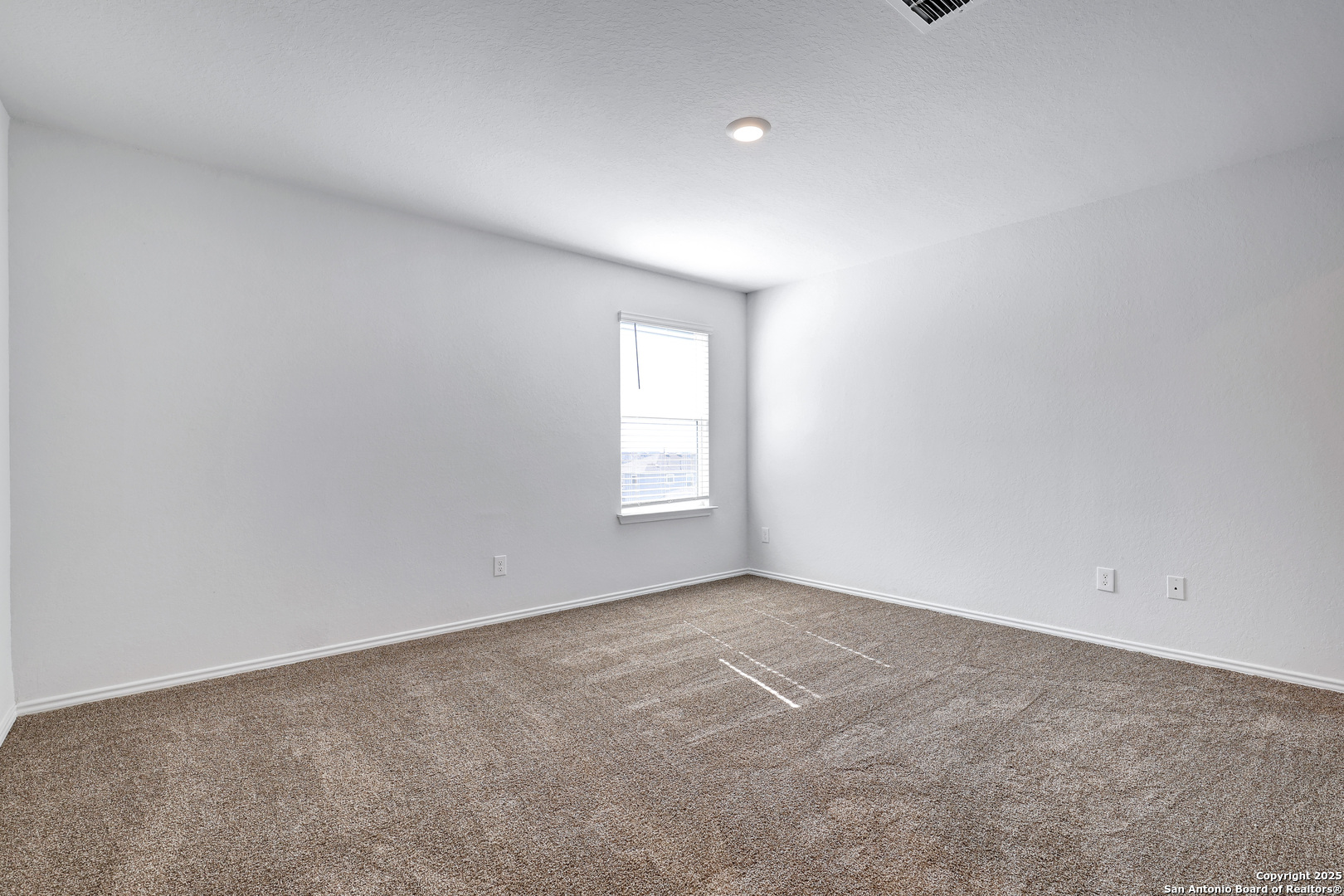 5867 Kendall Prairie San Antonio, TX 78244 - Photo 14 of 25 an empty room with a window