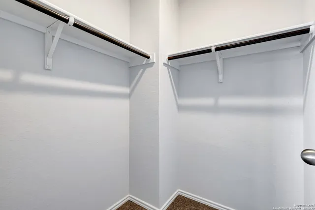 a view of a room with racks on the wall