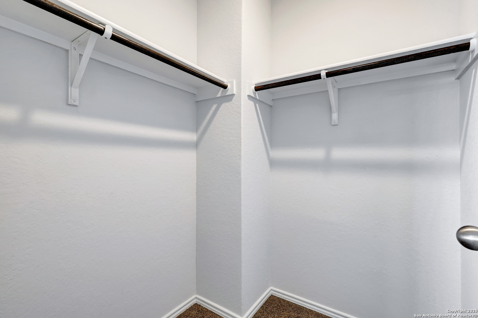 5867 Kendall Prairie San Antonio, TX 78244 - Photo 18 of 25 a view of a room with racks on the wall