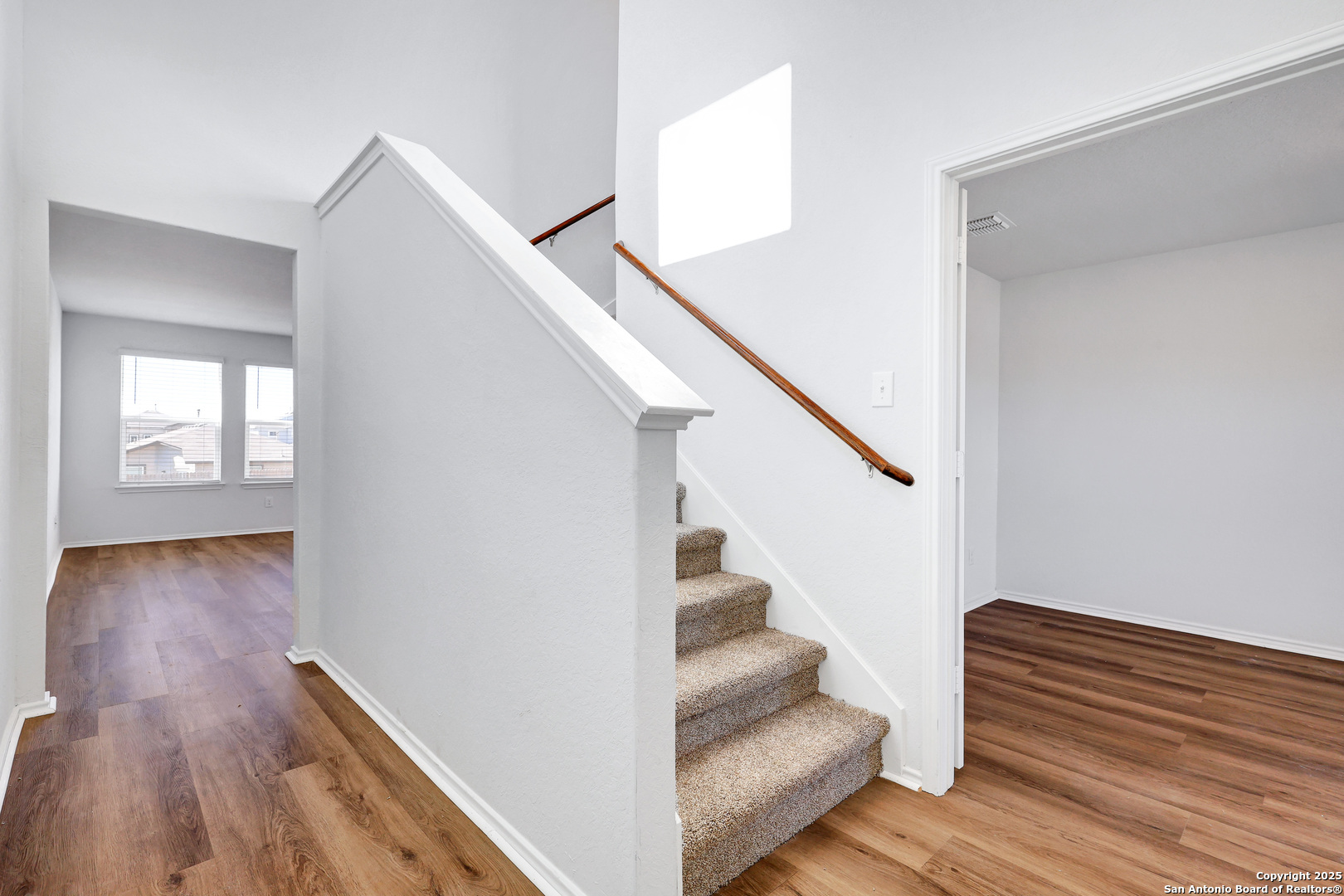 5867 Kendall Prairie San Antonio, TX 78244 - Photo 2 of 25 a view of entryway and hall with wooden floor