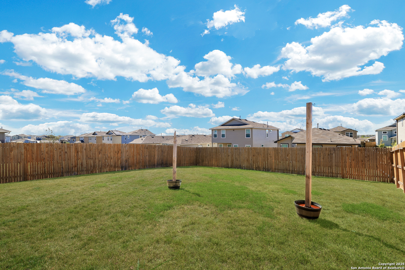 5867 Kendall Prairie San Antonio, TX 78244 - Photo 24 of 25 a backyard of a house with lots of green space