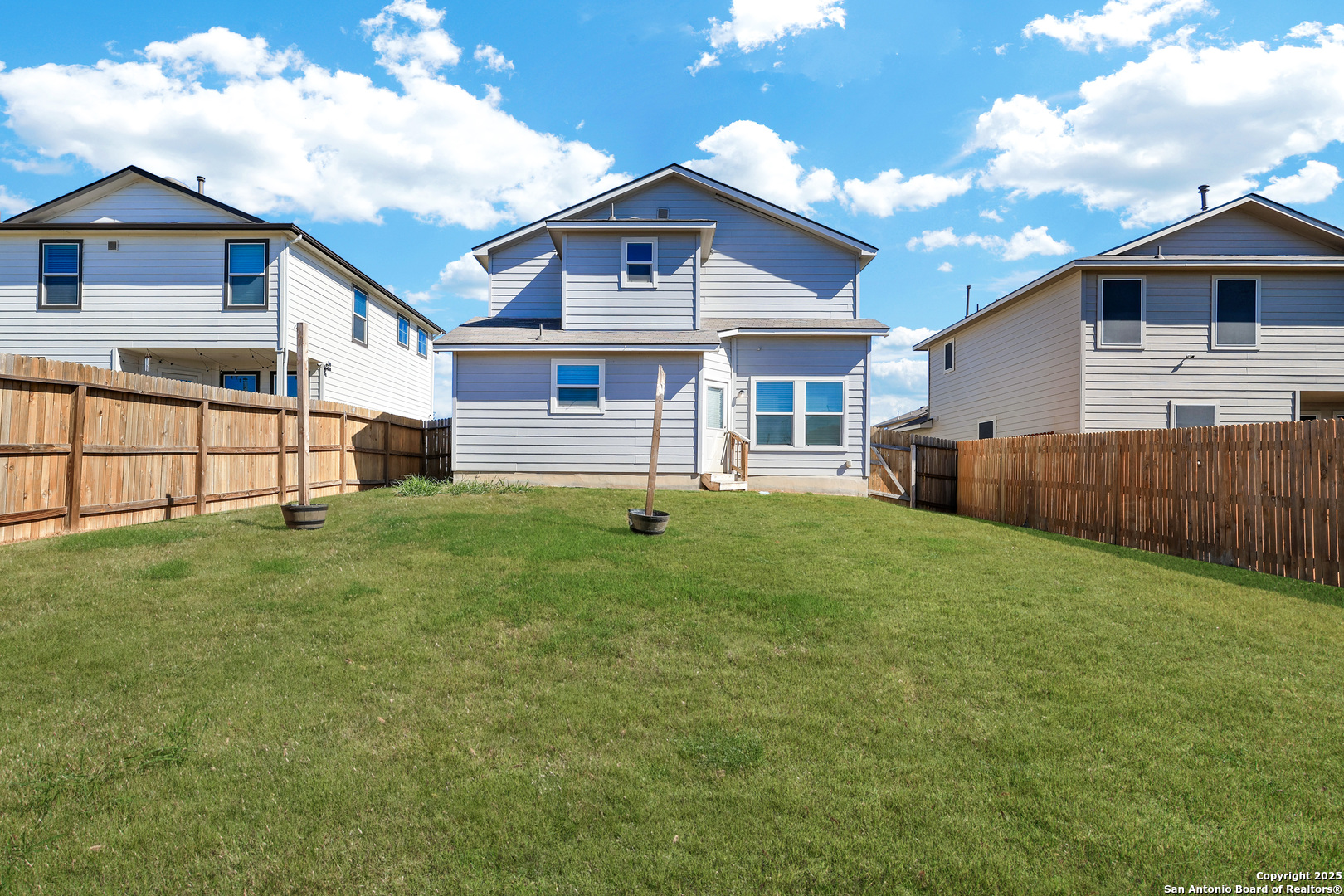5867 Kendall Prairie San Antonio, TX 78244 - Photo 25 of 25 a view of a yard in front of a house with a large tree