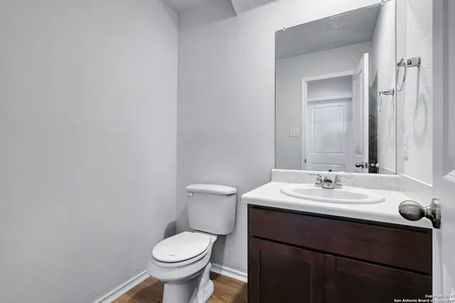a bathroom with a sink and a toilet