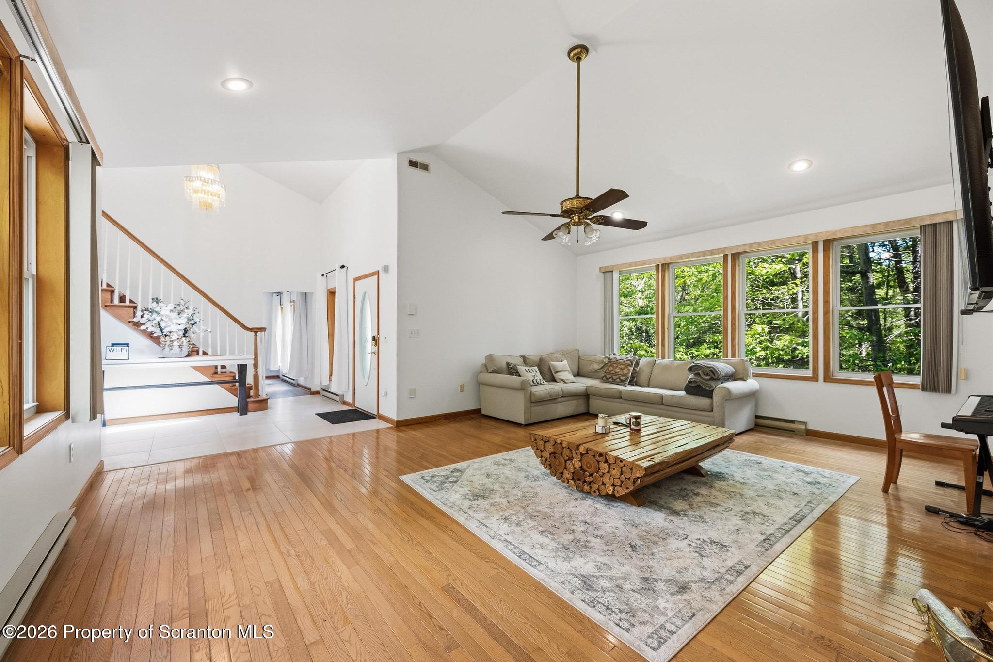 58 Bender Road Gouldsboro, PA 18424 - Photo 5 of 55 a living room with furniture and a large window