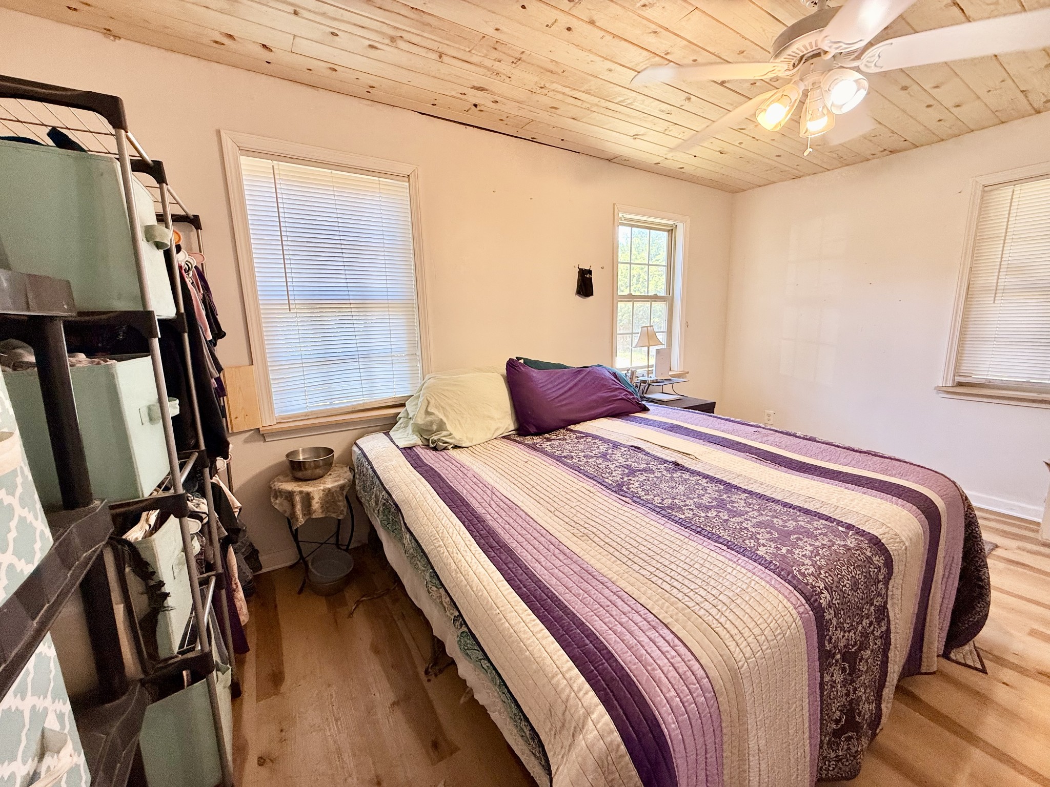 374 State Line Road Loretto, TN 38469 - Photo 15 of 24 a bedroom with a bed and a mirror