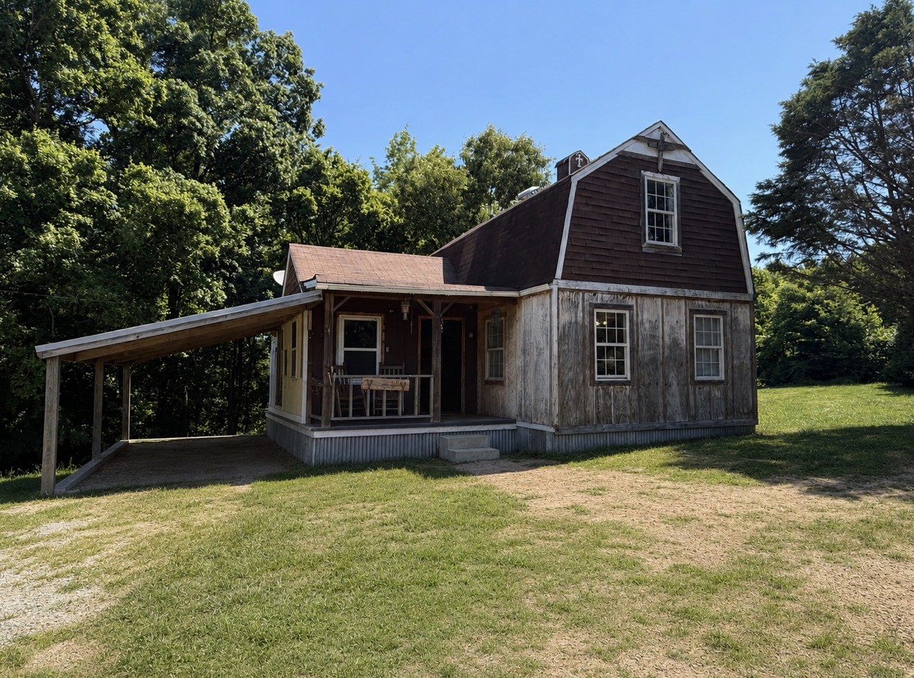 374 State Line Road Loretto, TN 38469 - Photo 2 of 24 a front view of a house with a yard