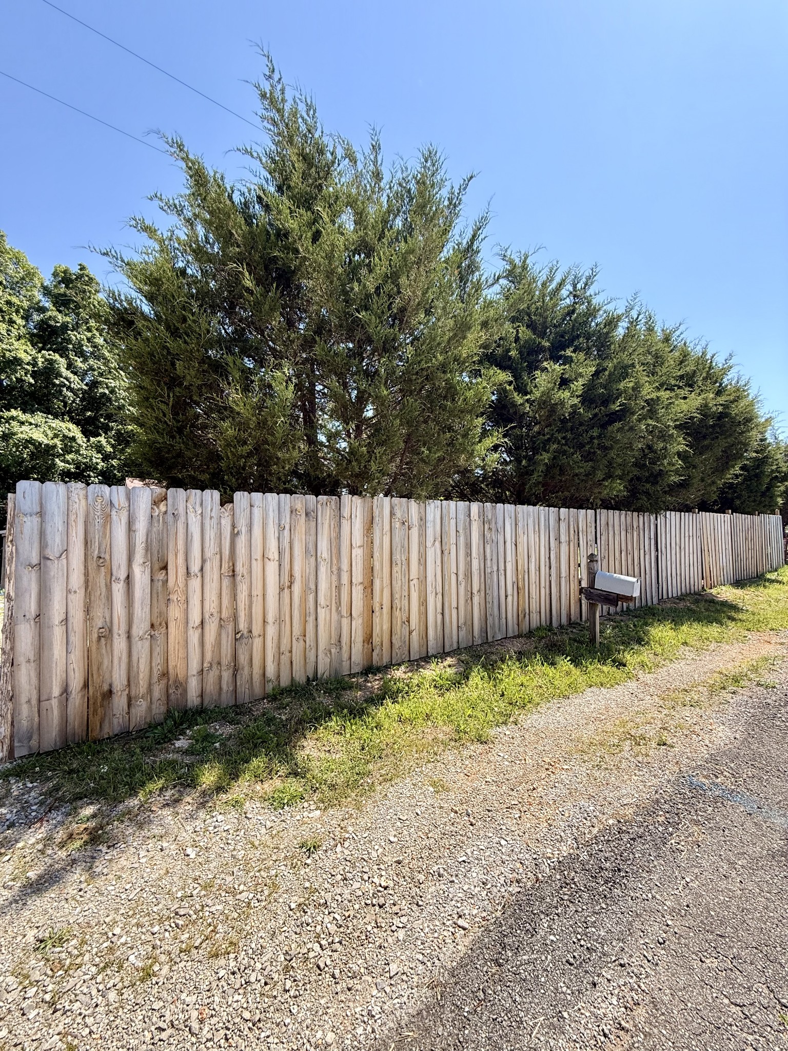 374 State Line Road Loretto, TN 38469 - Photo 23 of 24 a view of a backyard with wooden fence