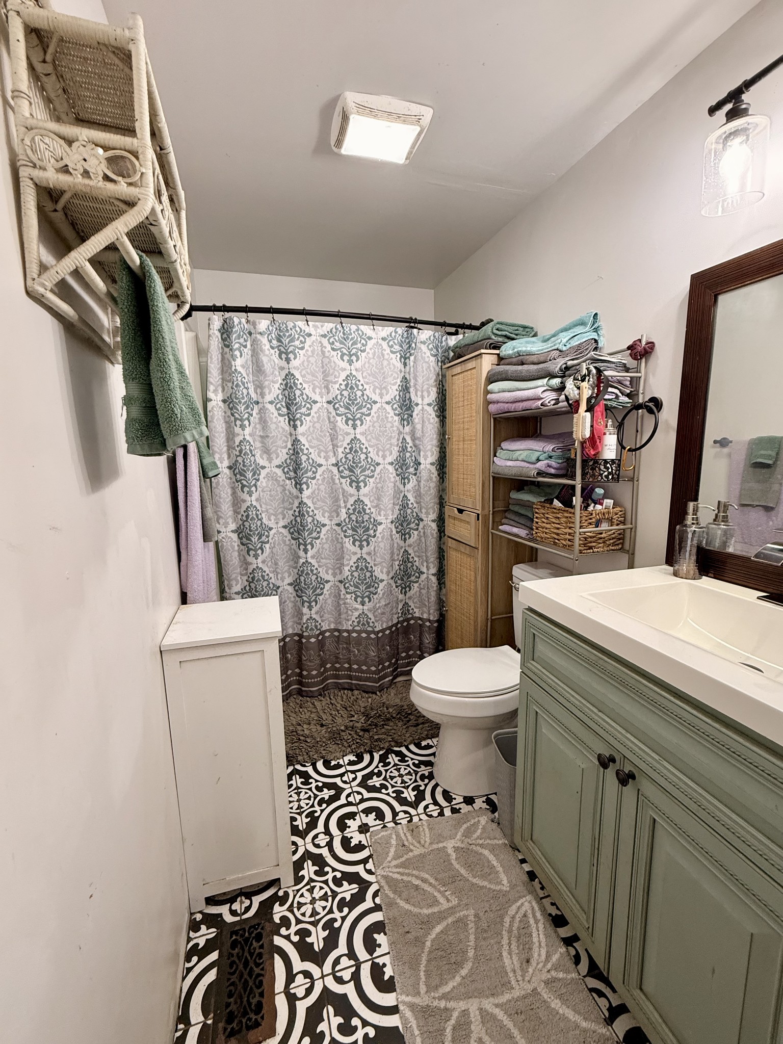 374 State Line Road Loretto, TN 38469 - Photo 9 of 24 a bathroom with a toilet a sink and a mirror