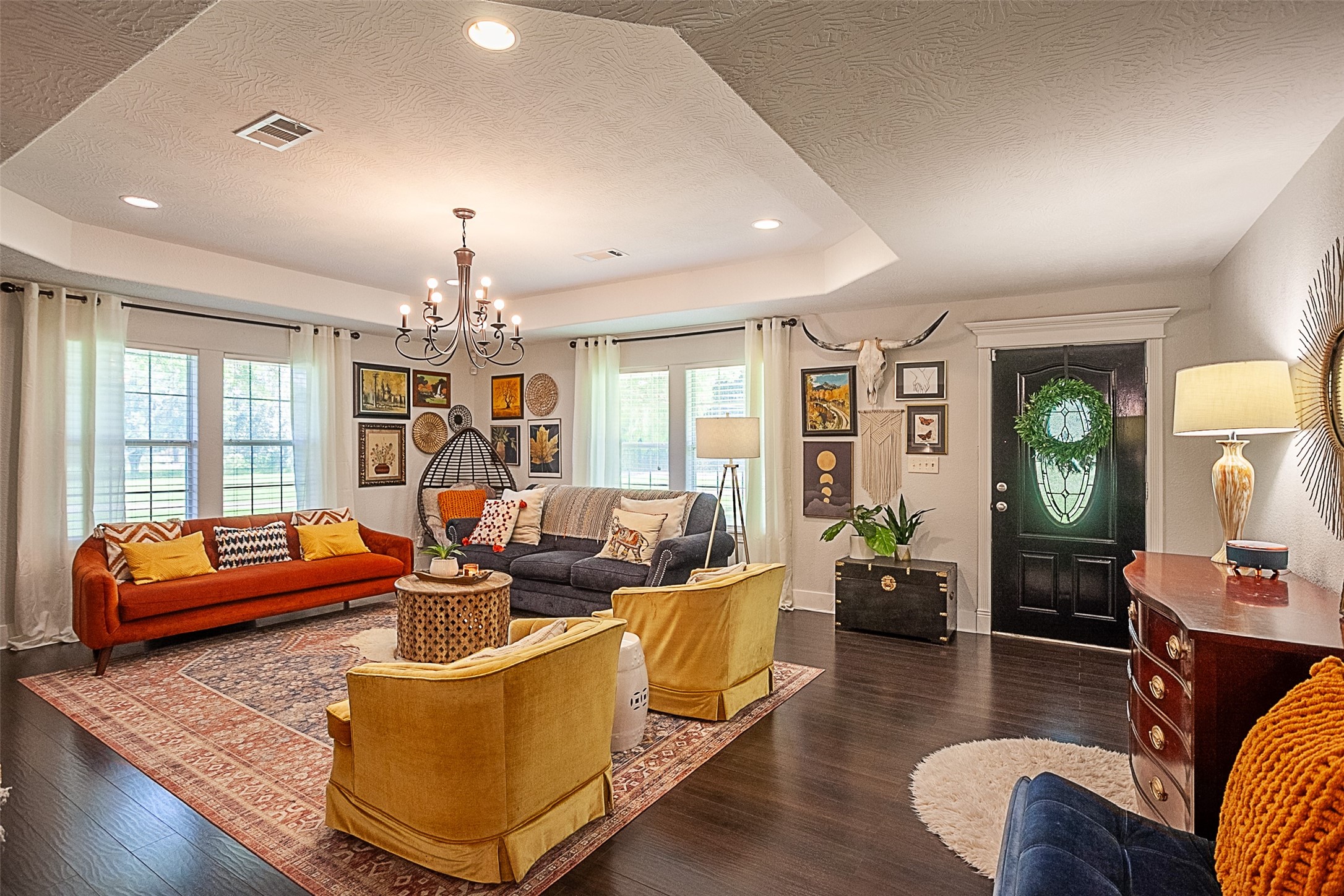2567 65th Street Port Arthur, TX 77640 - Photo 2 of 7 a living room with furniture fireplace and a large window