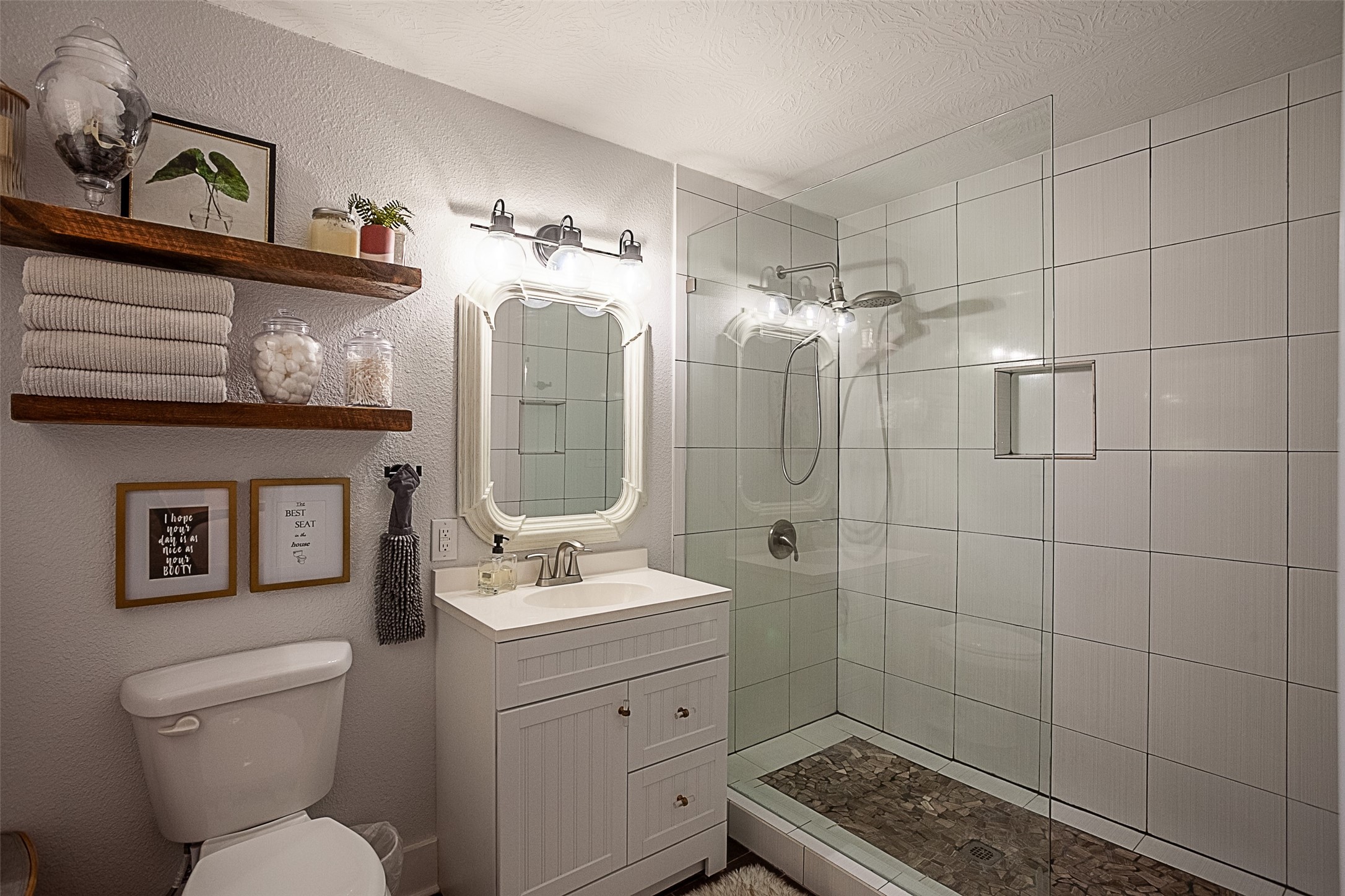 2567 65th Street Port Arthur, TX 77640 - Photo 7 of 7 a bathroom with a toilet sink and mirror