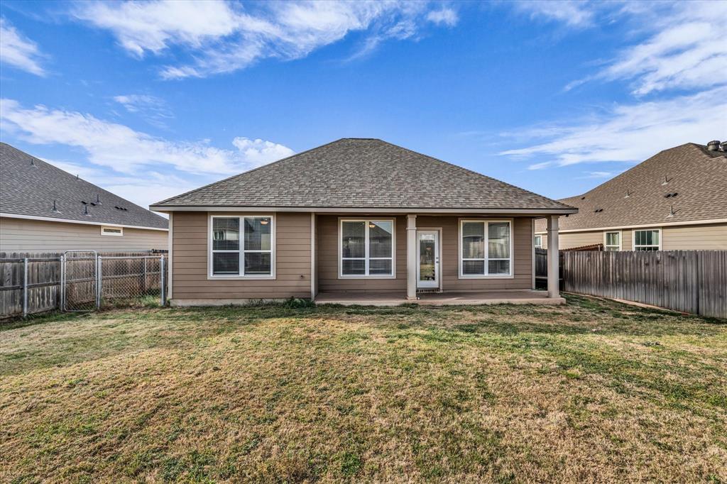 7008 Llano Drive China Spring, TX 76633 - Photo 25 of 26 a view of a house with a yard