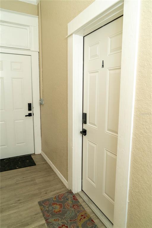 2906 West Chestnut Street, Unit 2 Tampa, FL 33607 - Photo 13 of 28 a view of a bathroom with wooden floor