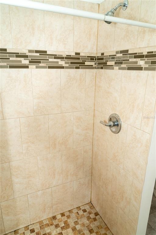 2906 West Chestnut Street, Unit 2 Tampa, FL 33607 - Photo 14 of 28 a bathroom with a shower