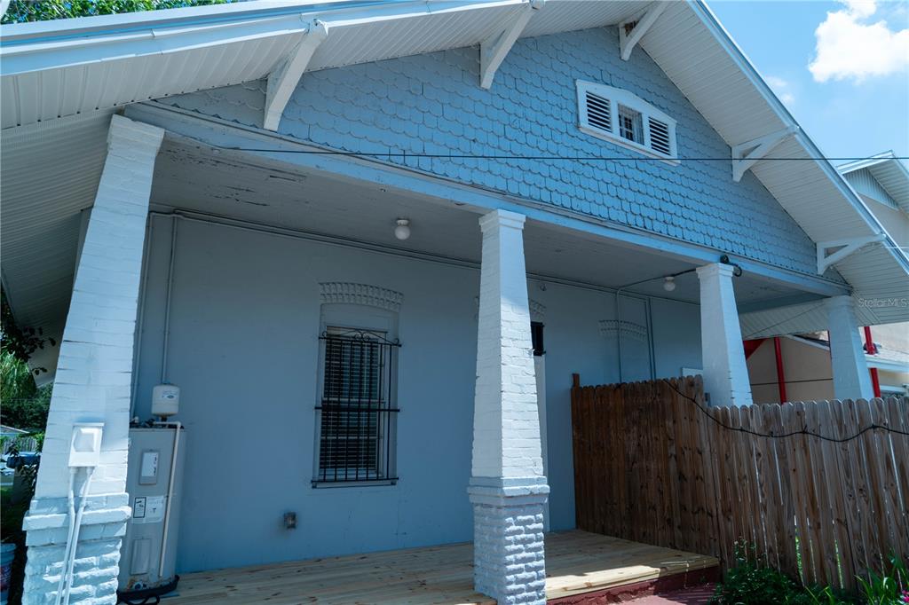 2906 West Chestnut Street, Unit 2 Tampa, FL 33607 - Photo 28 of 28 a front view of a house with a yard