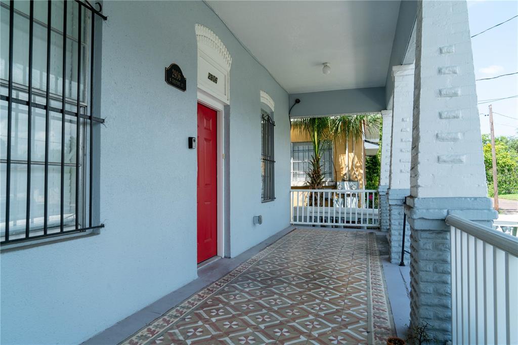 2906 West Chestnut Street, Unit 2 Tampa, FL 33607 - Photo 4 of 28 a view of a hallway with windows