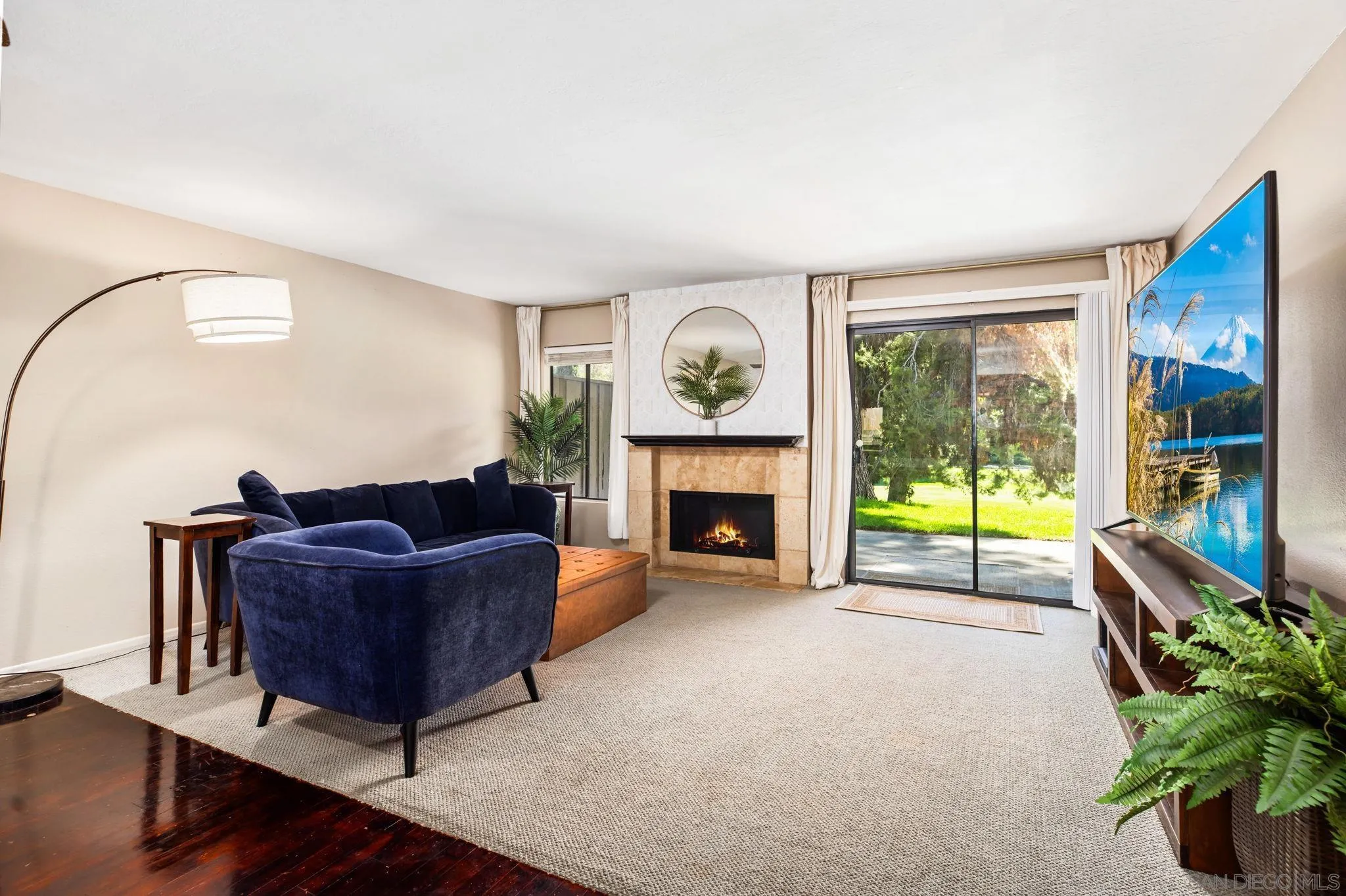 4121 Oak Island Lane Fallbrook, CA 92028 - Photo 3 of 25 a living room with furniture and a fireplace