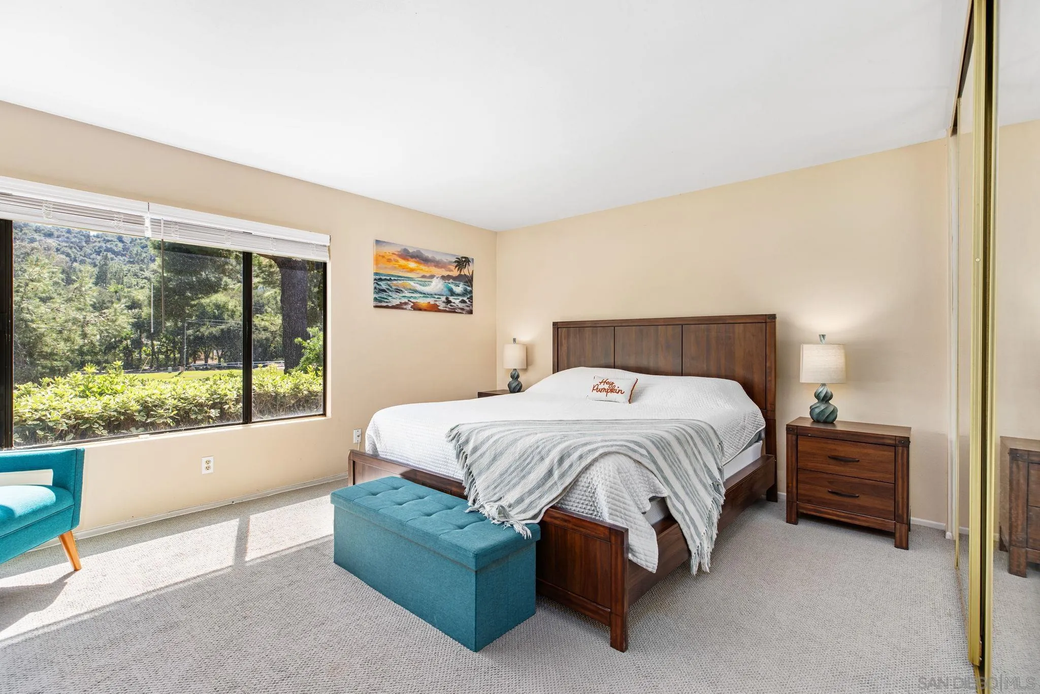 4121 Oak Island Lane Fallbrook, CA 92028 - Photo 9 of 25 a spacious bedroom with a bed and a large window