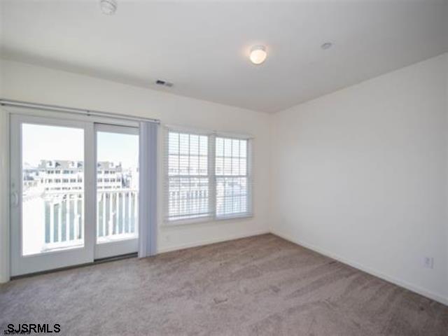 36 Chelsea Court, Unit 36 Atlantic City, NJ 08401 - Photo 11 of 23 a view of an empty room with a window