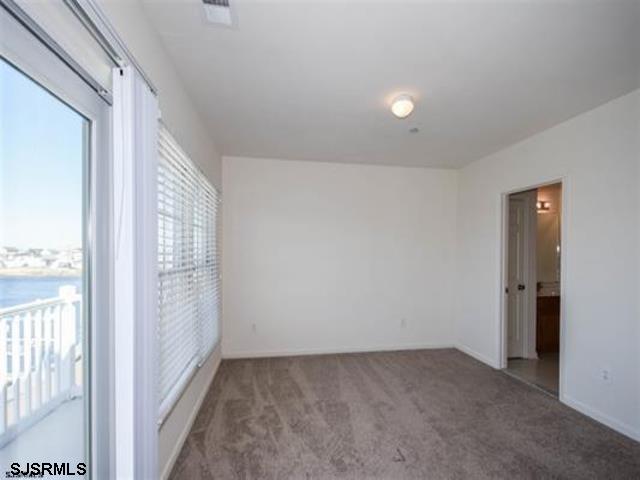36 Chelsea Court, Unit 36 Atlantic City, NJ 08401 - Photo 12 of 23 a view of an empty room with a window