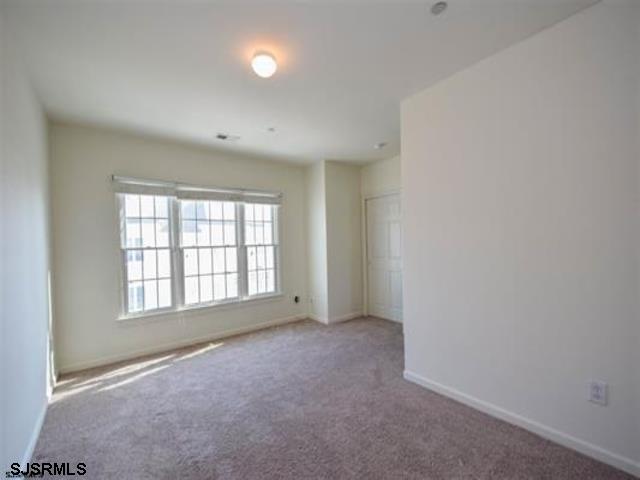 36 Chelsea Court, Unit 36 Atlantic City, NJ 08401 - Photo 17 of 23 an empty room with a window