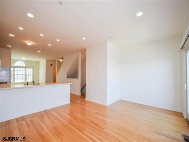 36 Chelsea Court, Unit 36 Atlantic City, NJ 08401 - Photo 5 of 23 a view of empty room with wooden floor