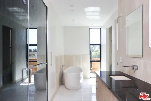 a view of a room with empty cabinets