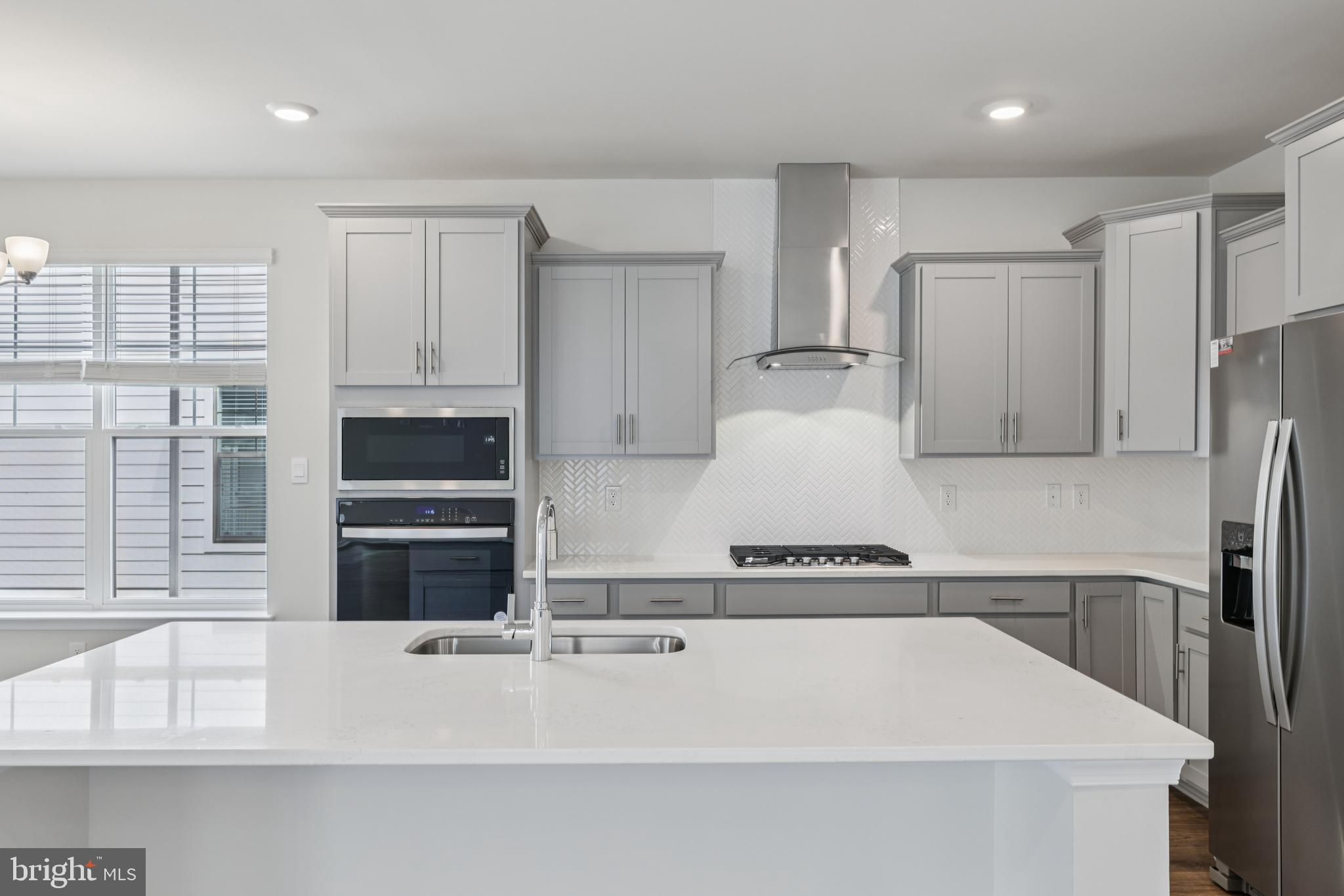 470 Herringbone Way Frederick, MD 21701 - Photo 25 of 61 a kitchen with stainless steel appliances a refrigerator and a sink