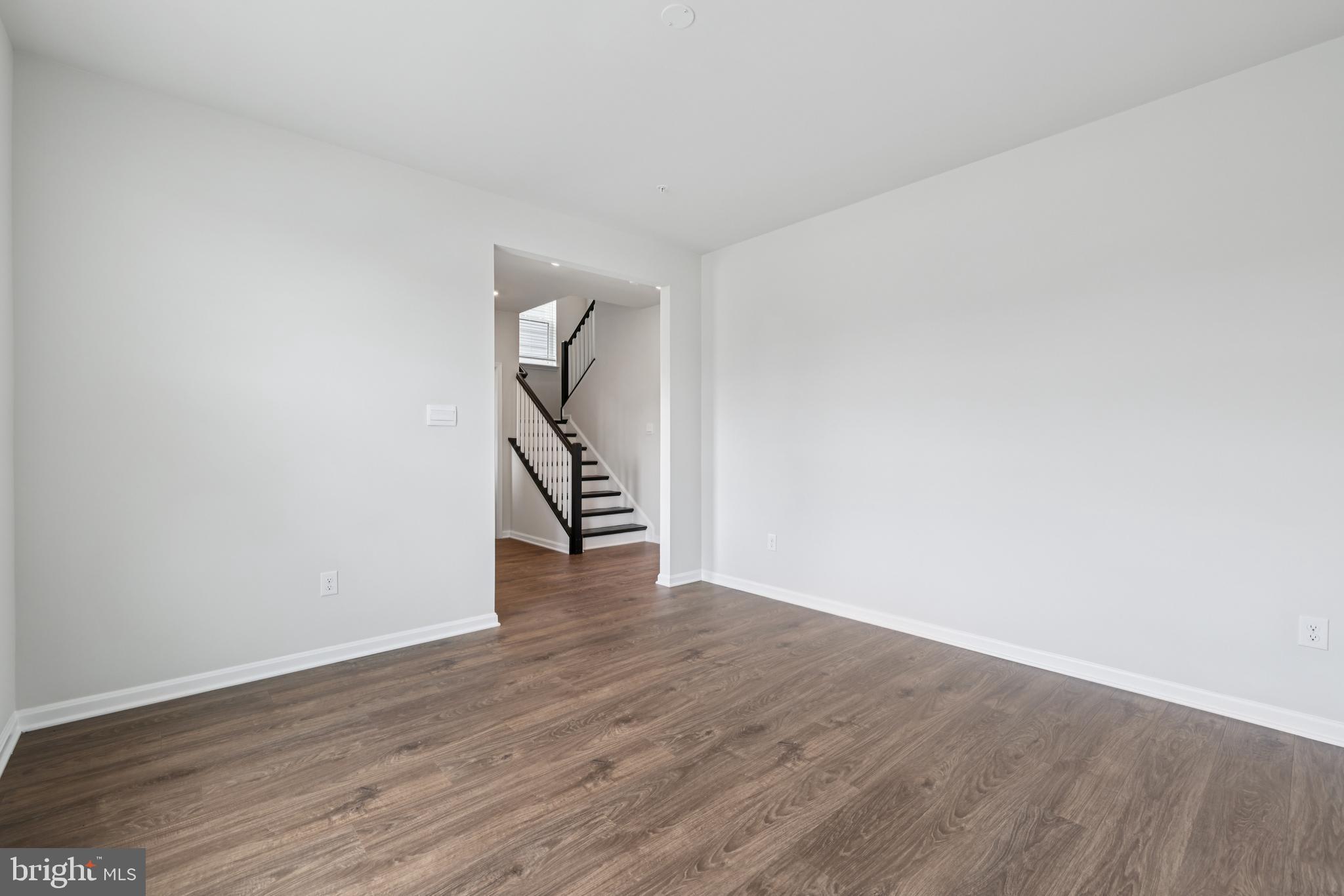 470 Herringbone Way Frederick, MD 21701 - Photo 28 of 61 a view of an empty room with wooden floor and a window
