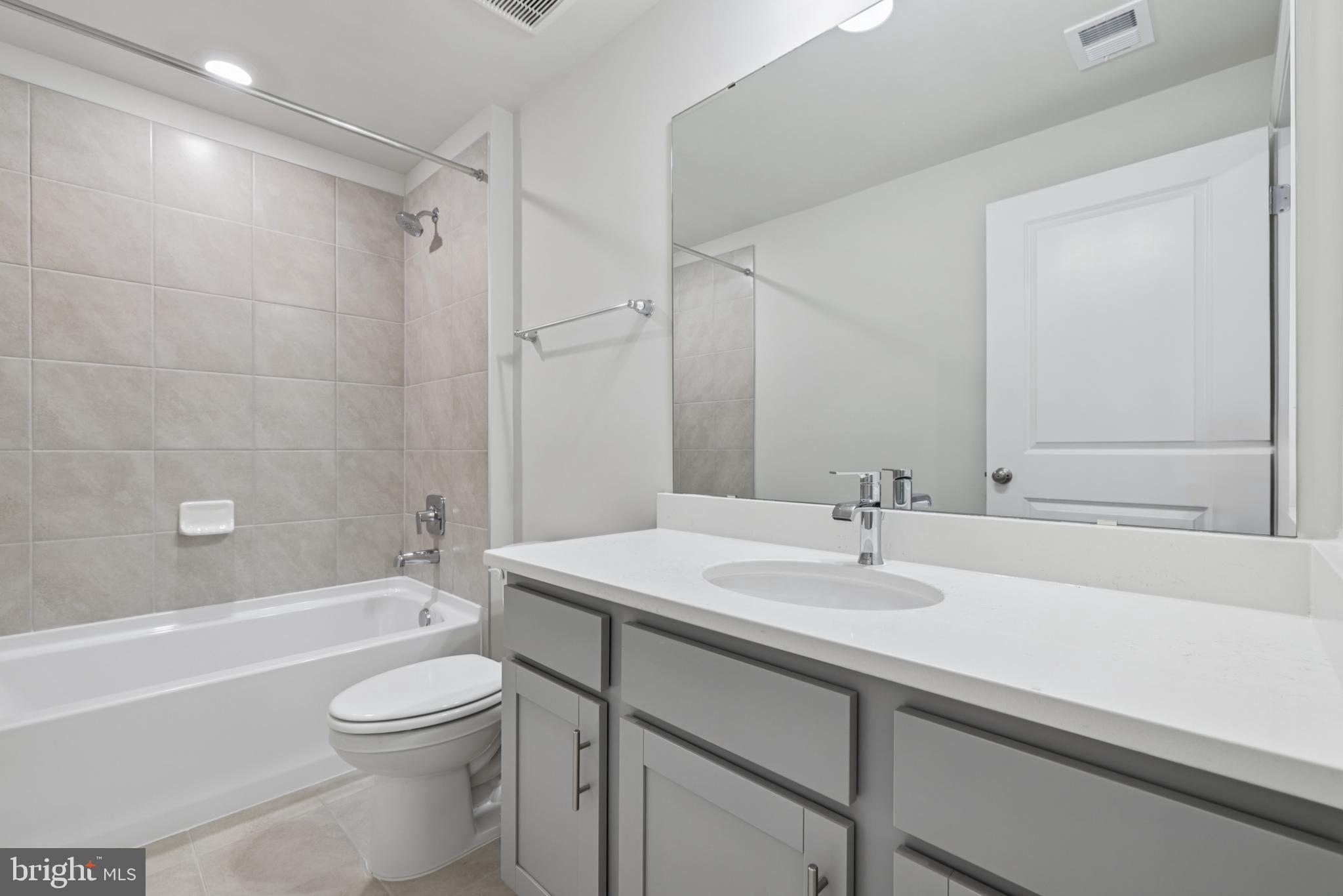 470 Herringbone Way Frederick, MD 21701 - Photo 35 of 61 a bathroom with a sink a toilet and a bathtub