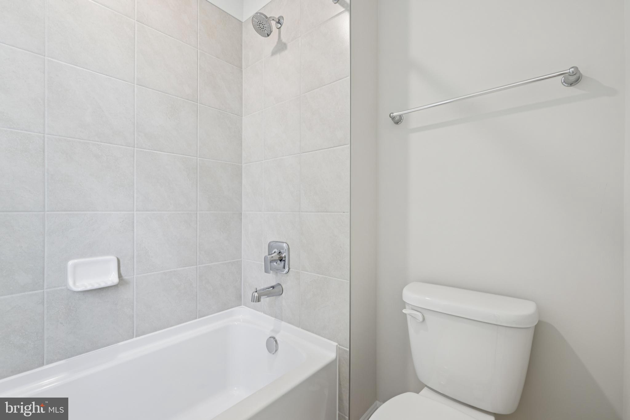 470 Herringbone Way Frederick, MD 21701 - Photo 37 of 61 a bathroom with a toilet and bathtub