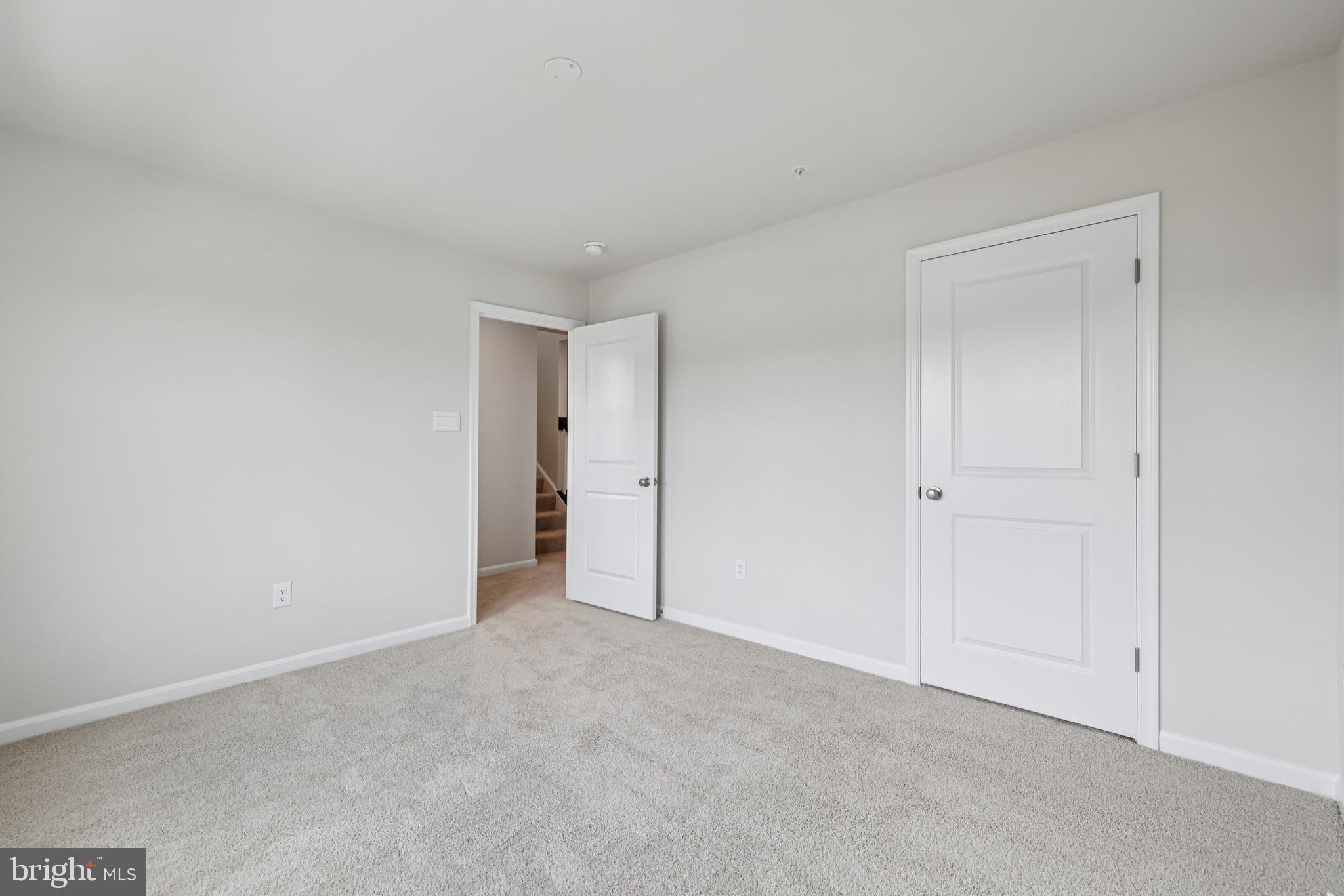 470 Herringbone Way Frederick, MD 21701 - Photo 40 of 61 a view of an empty room and closet area