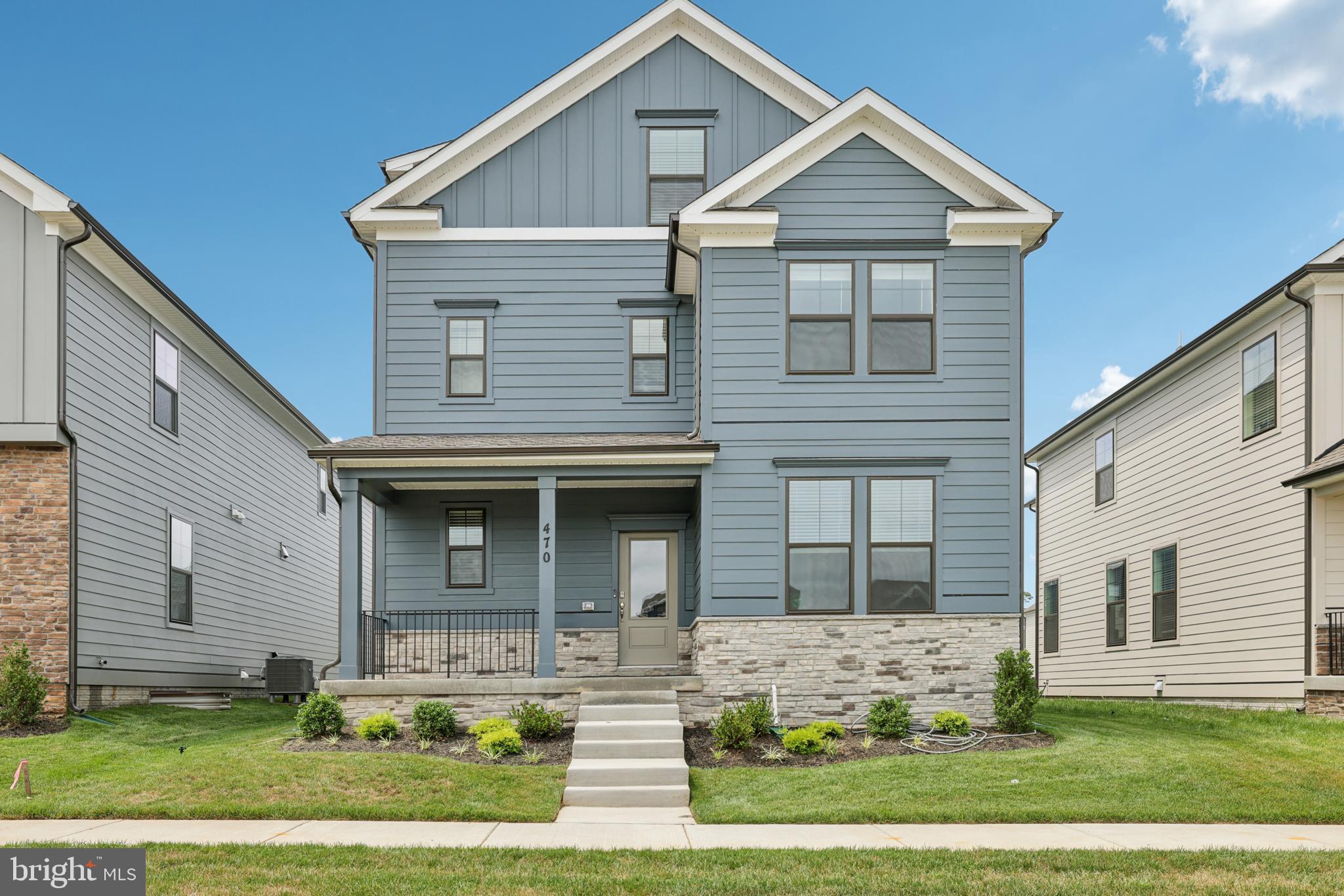 470 Herringbone Way Frederick, MD 21701 - Photo 4 of 61 a front view of a house with garden