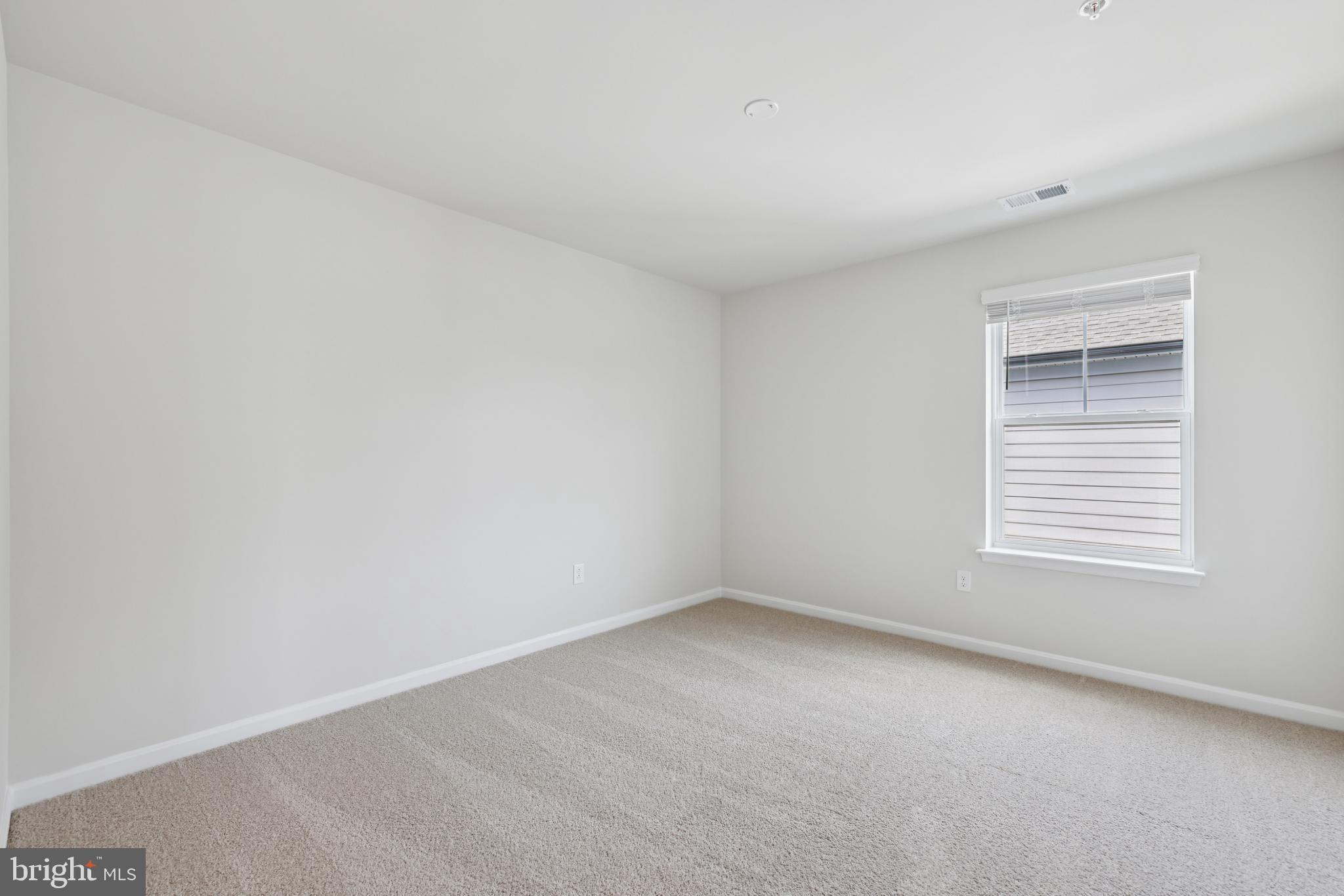 470 Herringbone Way Frederick, MD 21701 - Photo 41 of 61 an empty room with a window